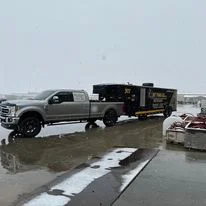 Commercial spray foam insulation truck with application equipment at job site