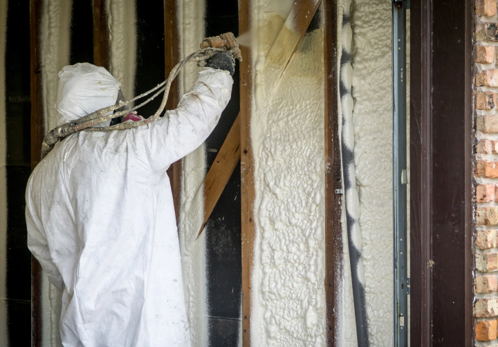 man spraying closed cell work insulation casper wy